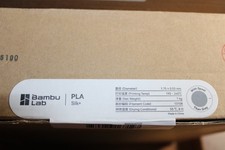 Bambu Lab PLA Silk+ 1,75 1 kg filamento per stampante 3D grigio titanio con bobina